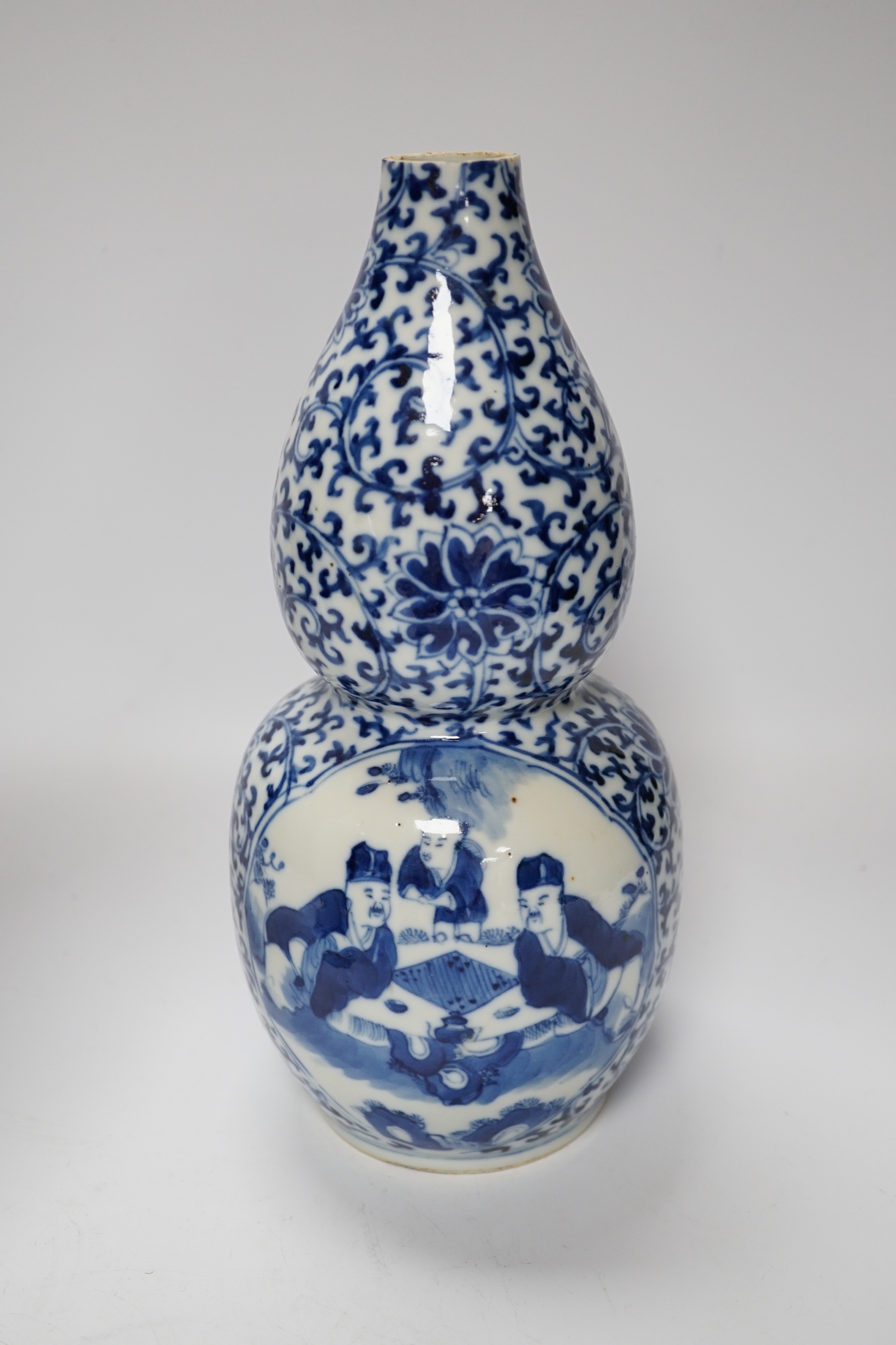 Five 19th century Chinese various sized blue and white figural vases, tallest double gourd vase 27cm high